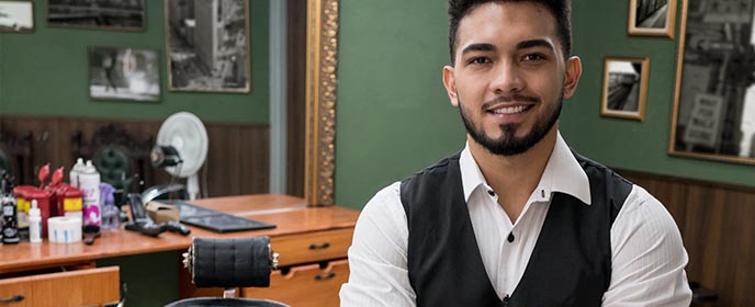 Barber shop owner in shop