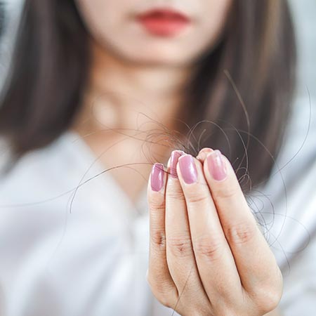 Lady pulling hair out