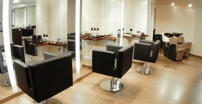 Empty salon chair representing client no-shows or last-minute cancellations