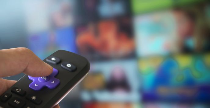 Close-up of salon TV being turned on to show need for proper TV licence
