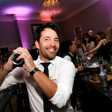 Bar tending making cocktail